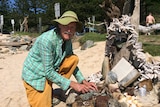 Rick Thomsom-Jones with an Easter beach sculpture in Port Macquarie.