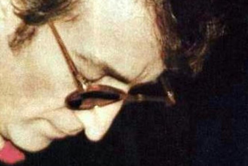 John Lennon signs an autograph for Mark Chapman hours before being killed.