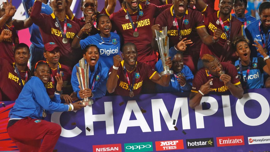 West Indies men and women celebrate together