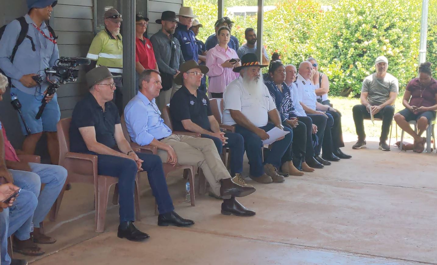 Senior State and Federal Ministers and officials at a community meeting in flood-ravaged Fitzroy Crossing