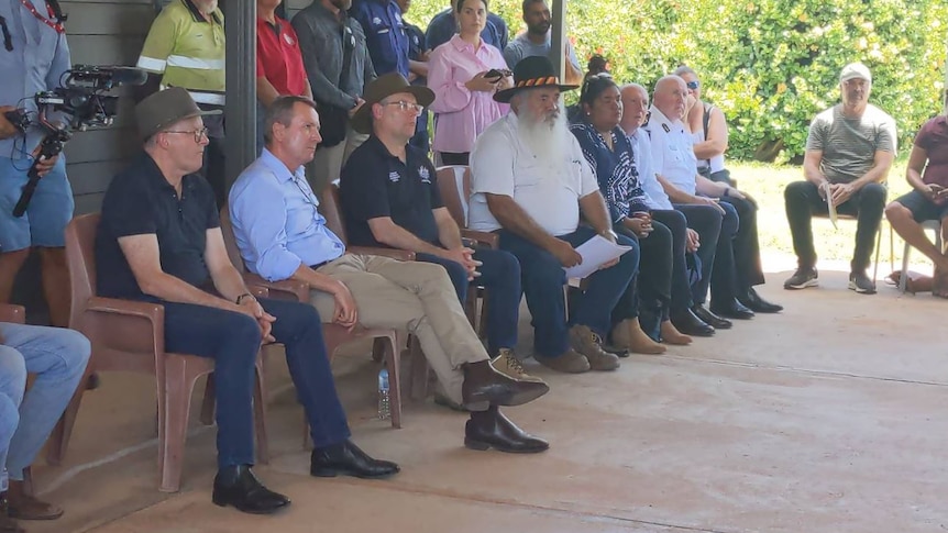 Senior State and Federal Ministers and officials at a community meeting in flood-ravaged Fitzroy Crossing