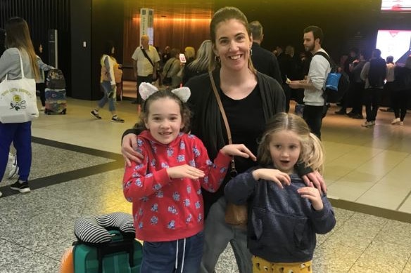Shona Hendley and her kids at the airport.