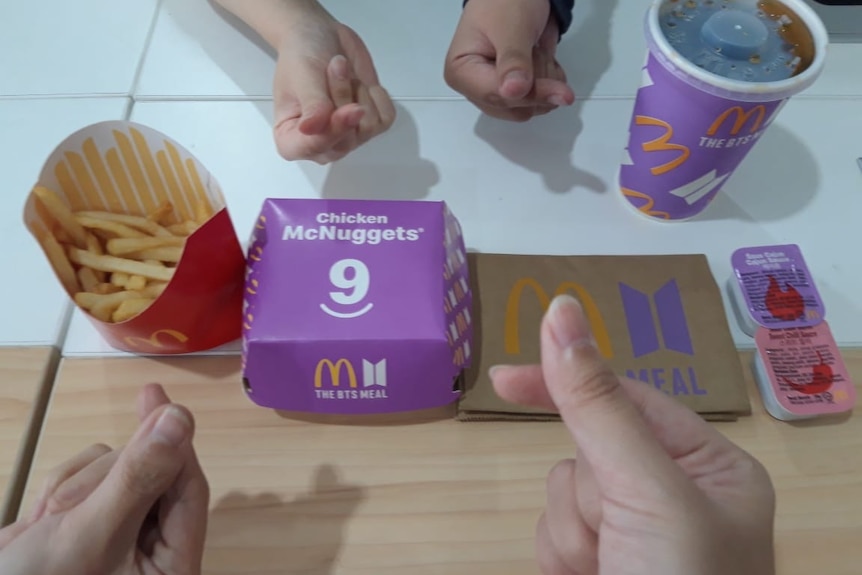 A McDonald's meal in purple packaging. 