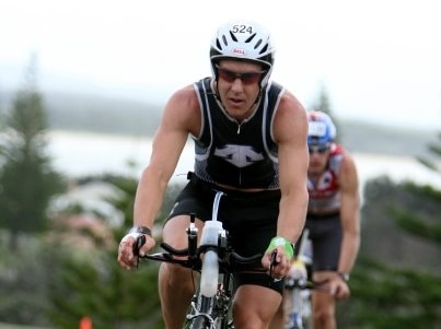 Michael Forbes rides his racing bike uphill