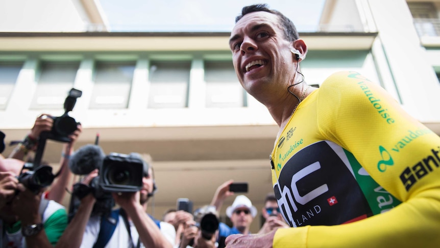 Cyclist Richie Porte reacts after winning the Tour of Switzerland
