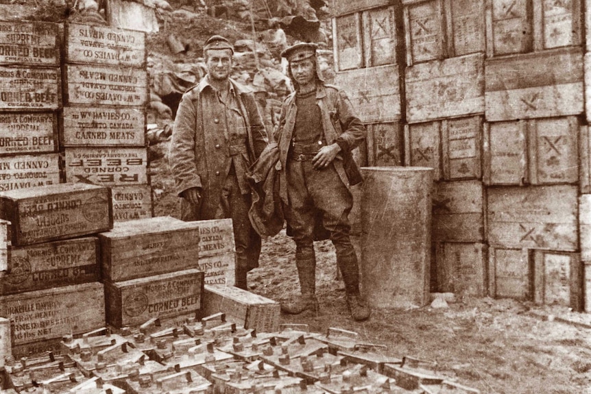 Two soldiers with supplies, Gallipoli Peninsula, Turkey, May 1915.
