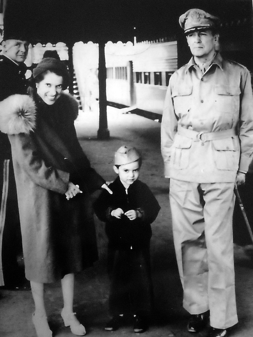 family at train station in the 1940s