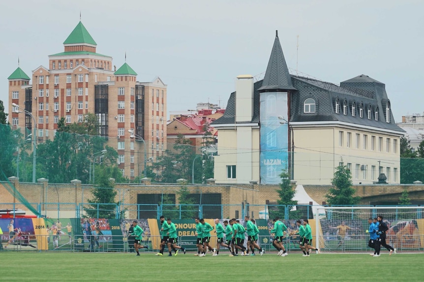 The Socceroos train, with Kazan in the background.