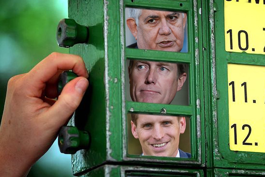 A bookies sign with pictures of Ken Wyatt, Christian Porter and Andrew Hastie.