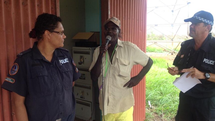 Police and an Elcho Island community member take to the town PA system to warn of Cyclone Nathan's approach.