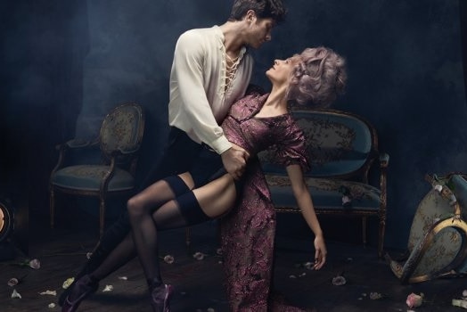 A shot promoting Dangerous Liaisons, with a women reclining about to be kissed, her leg exposed.