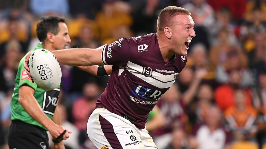 Sean Keppie reacts after scoring a try for Manly