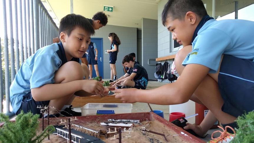 Primary school kids working on a urban landscape model. 