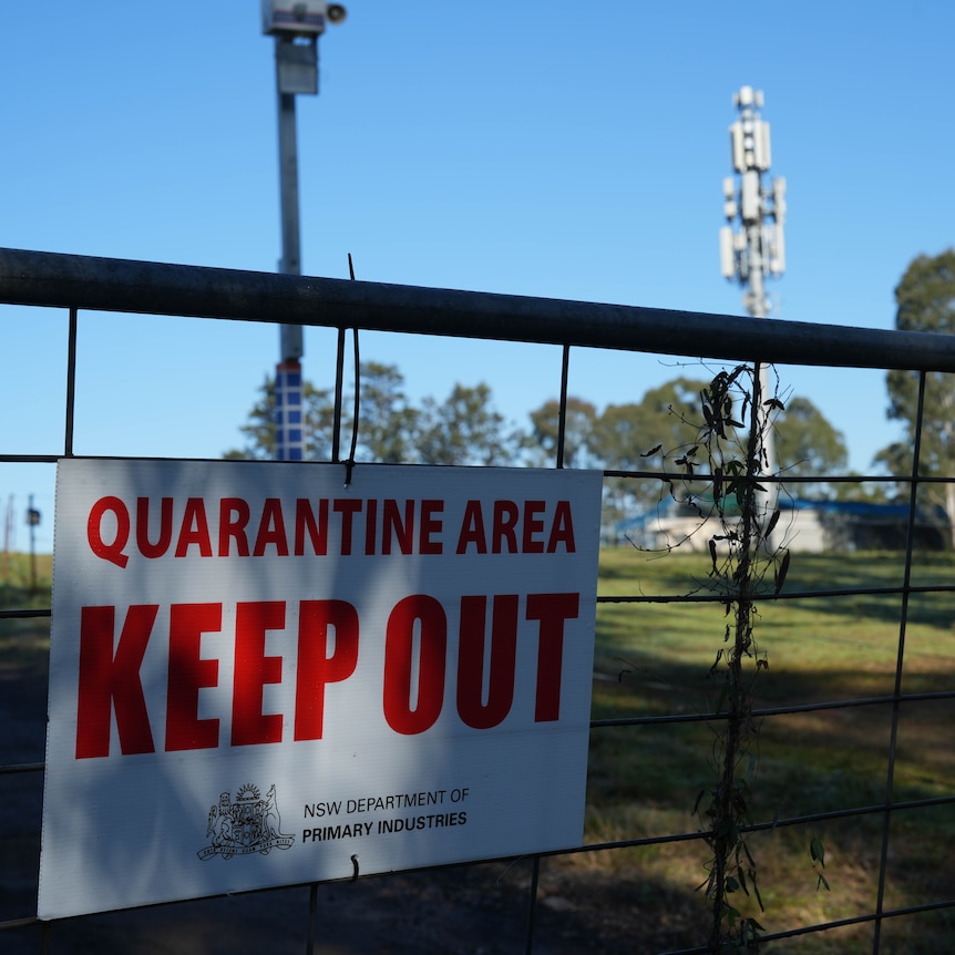 Photos of farms on a clear day currently under quarantine, with signs instructing people to keep out