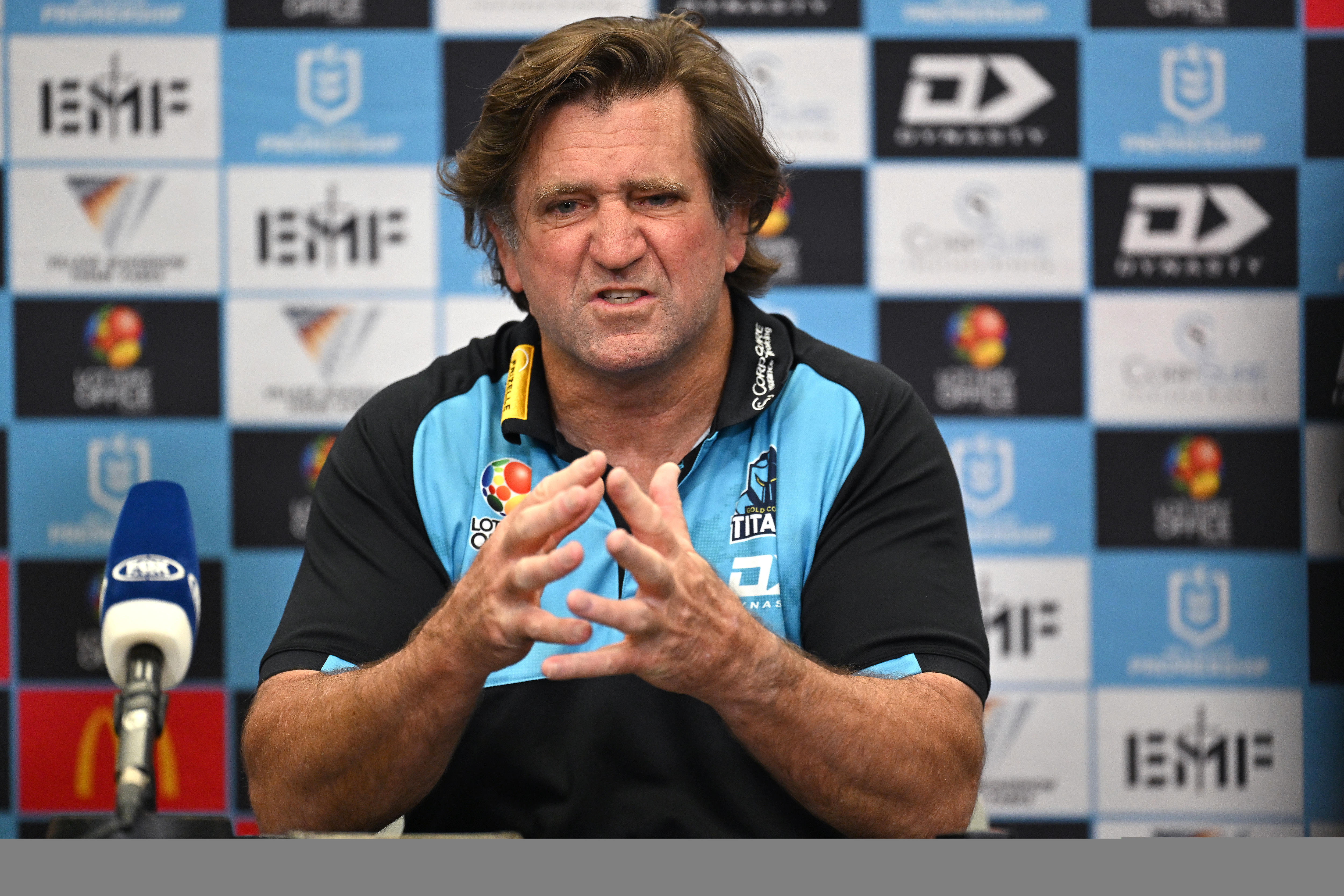 Gold Coast Titans coach Des Hasler pulls a face during a press conference.