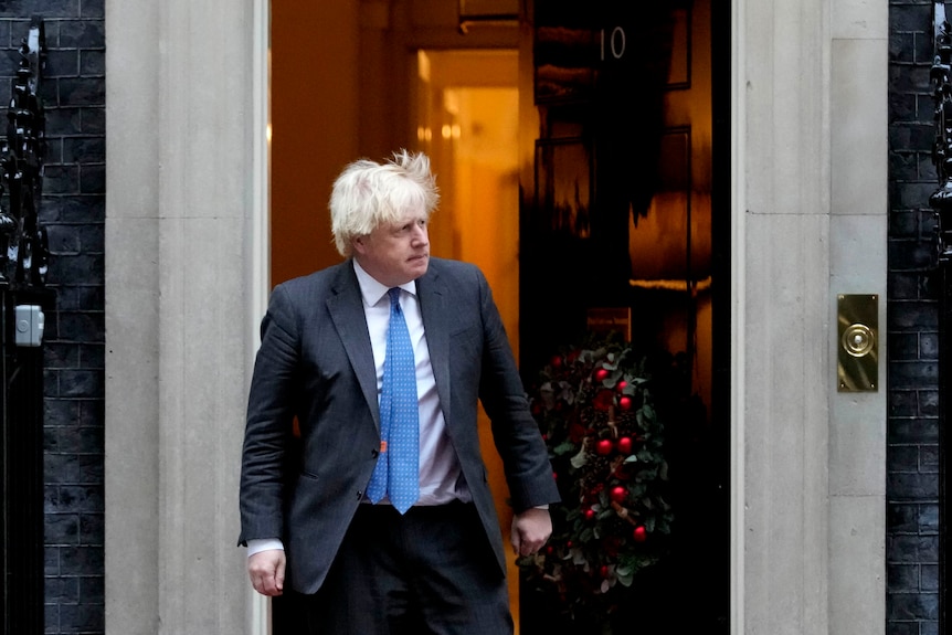 Britain's Prime Minister Boris Johnson steps out of 10 Downing Street