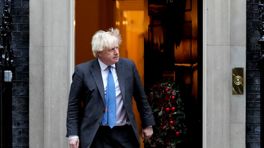 Britain's Prime Minister Boris Johnson steps out of 10 Downing Street