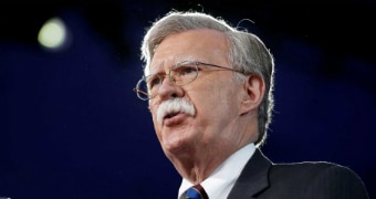 An upward shot of John Bolton's face