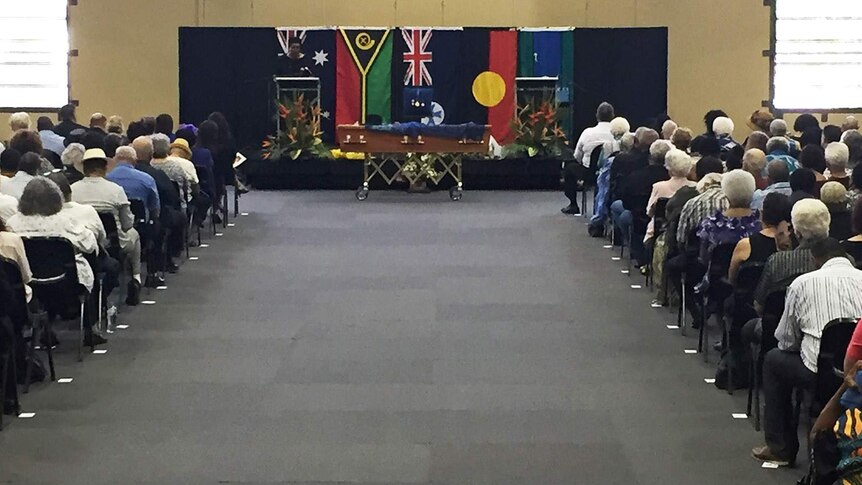 Friends, family and dignitaries gathered in Townsville with the coffin of Dr Evelyn Scott at the front of the room