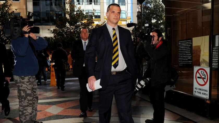 Former Olympic swimmer Scott Miller arrives at Downing Centre court in Sydney