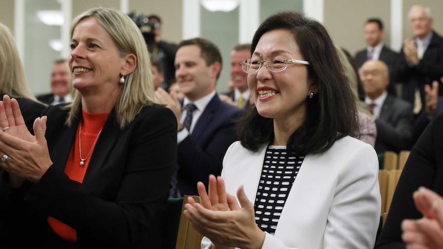 Gladys Liu, right, sitting in the joint partyroom this morning.