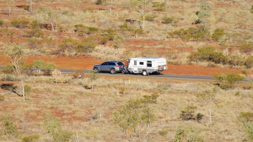 car towing caravan