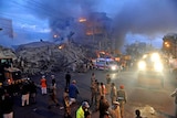 Police said seven people had been pulled alive from the rubble.