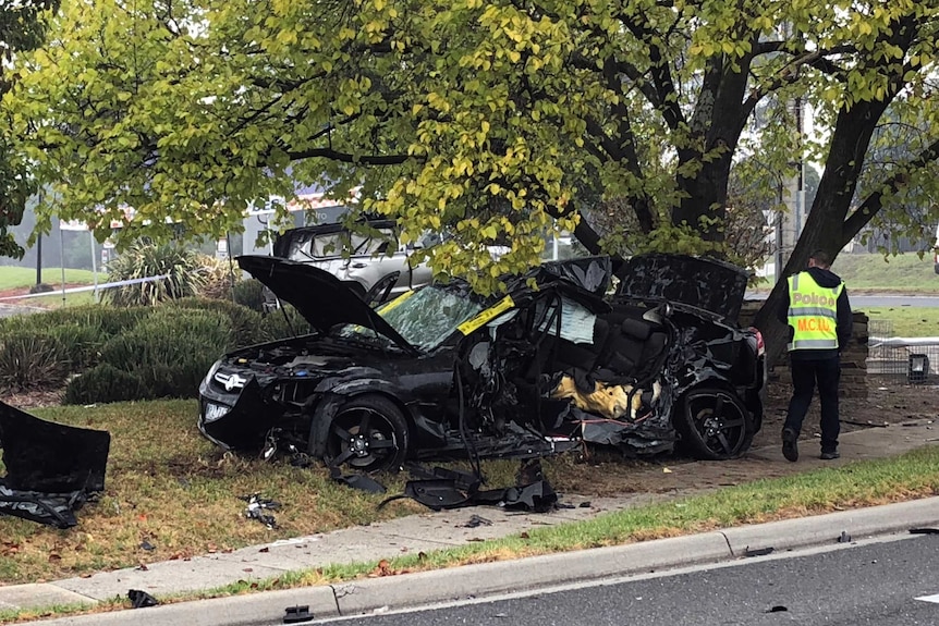 Damaged car at the scene of the crash.