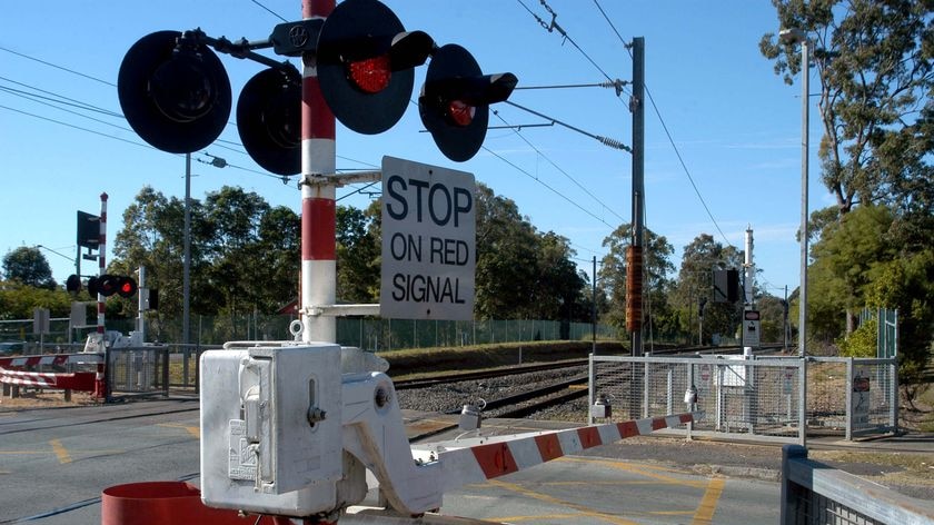 Last year there were 702 reported near-accidents at level crossings across Queensland.