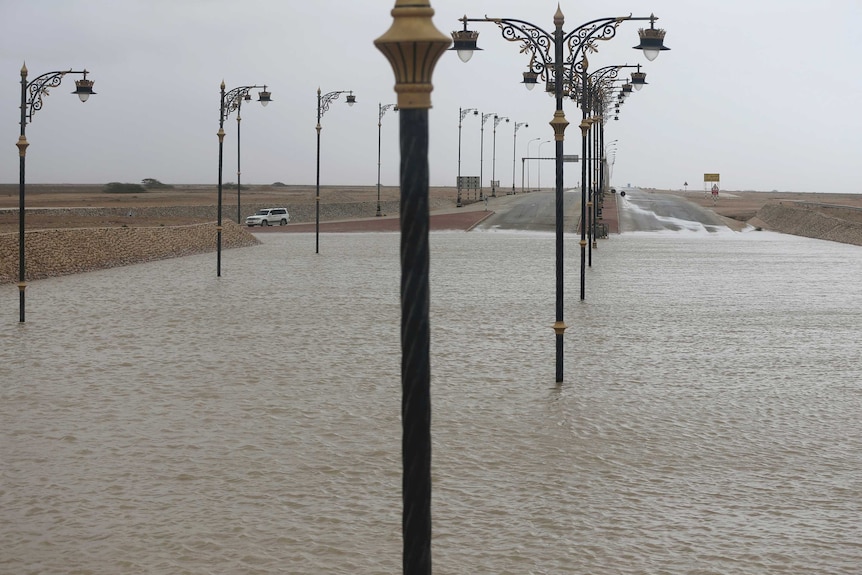 Flood waters across a road.