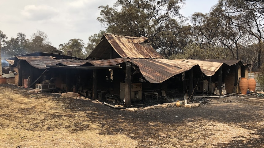 A completely burnt out shed