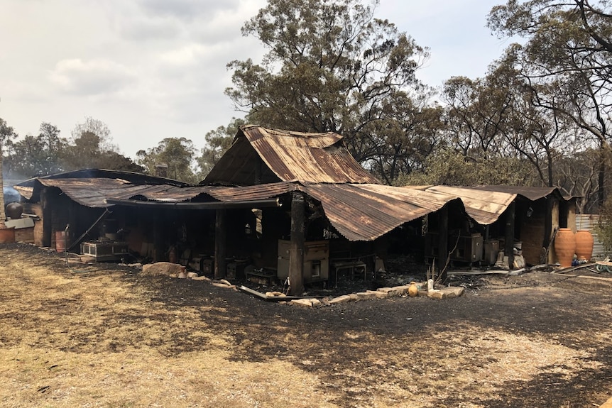 A completely burnt out shed