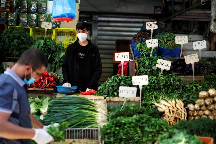 Shoppers at a Tel Aviv market