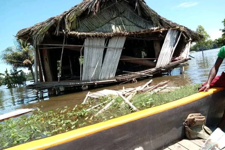 A house is on the verge of collapsing in flood waters in East Sepik province, Papua New Guinea after an earthquake.