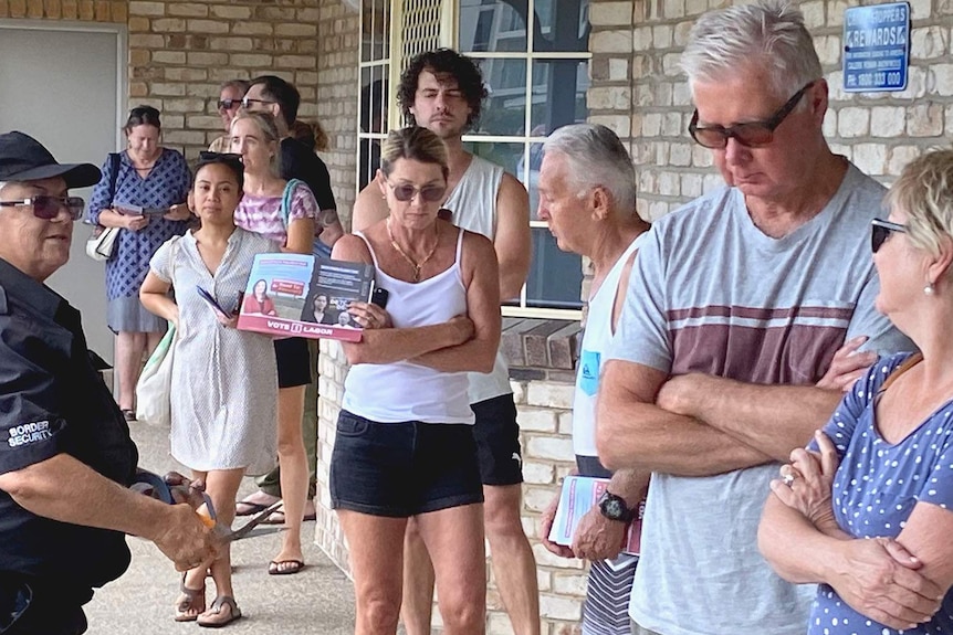 A queue of people at an early voting centre