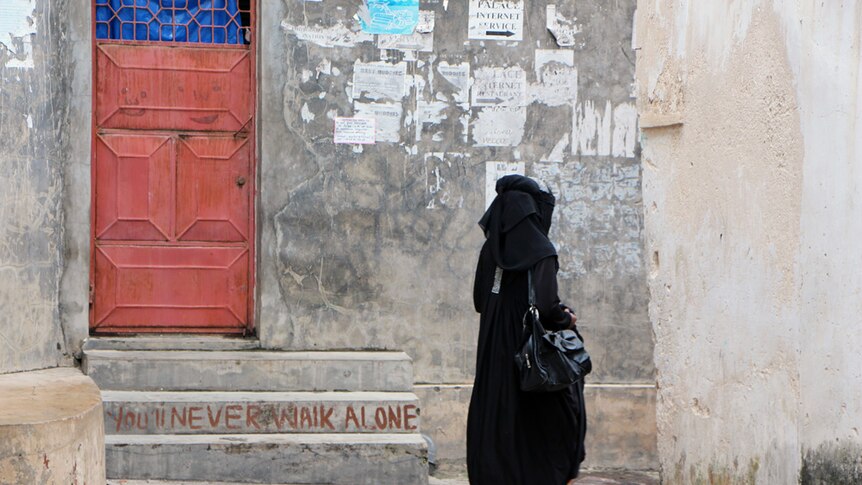 A woman walking alone in Zanzibar