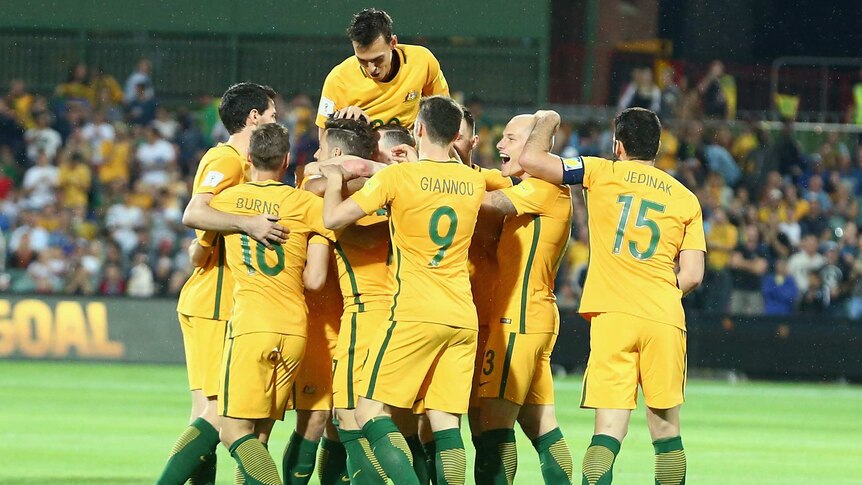 Socceroos celebrate a goal in Adelaide
