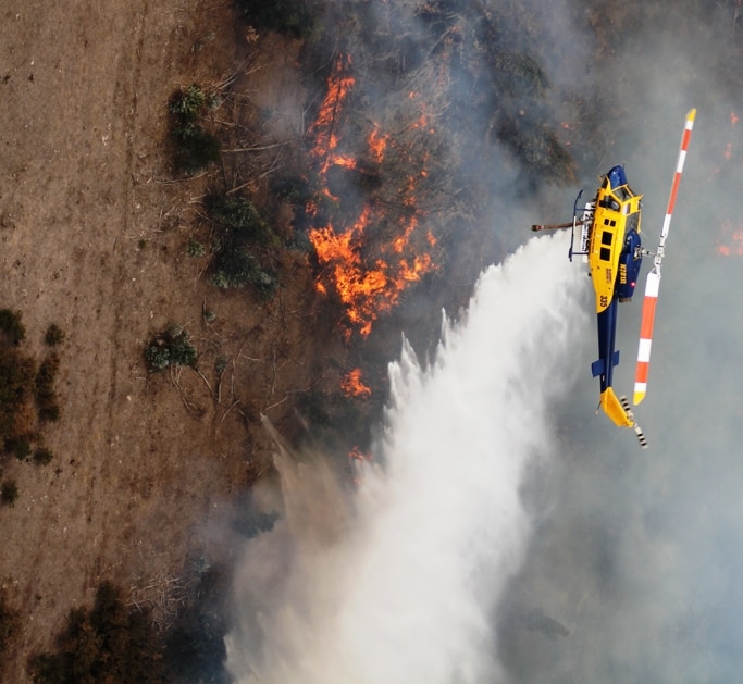 Helicopters battle blaze at Mount Bolton