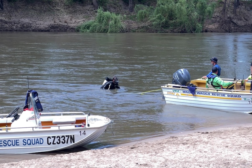 police divers search a river