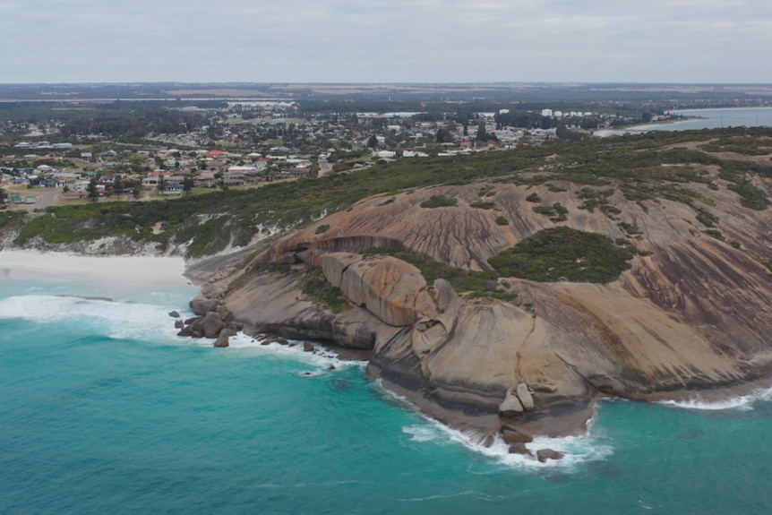 A drone shot over Dempster Head in Esperance, with the ocean and town in the background