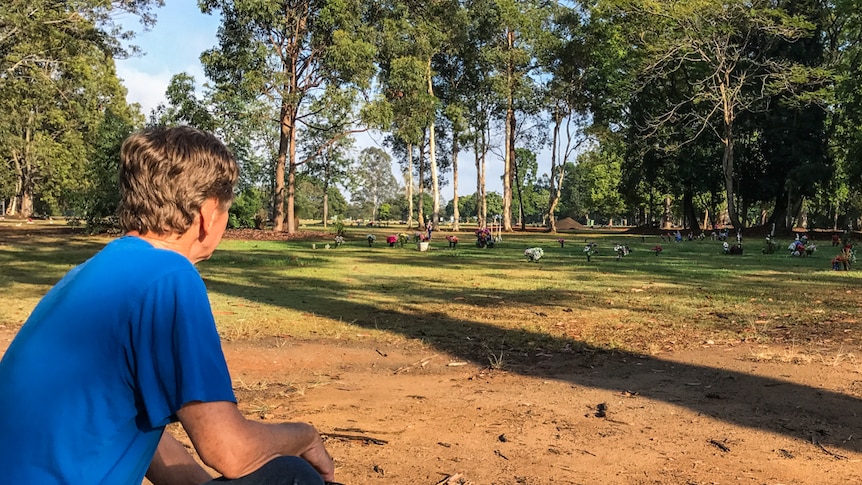 A gardener standing at a lawn cemetery in Mt Gravatt.