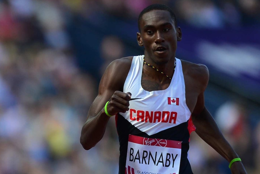 Daundre Barnaby runs the 400m at the Glasgow Commonwealth Games