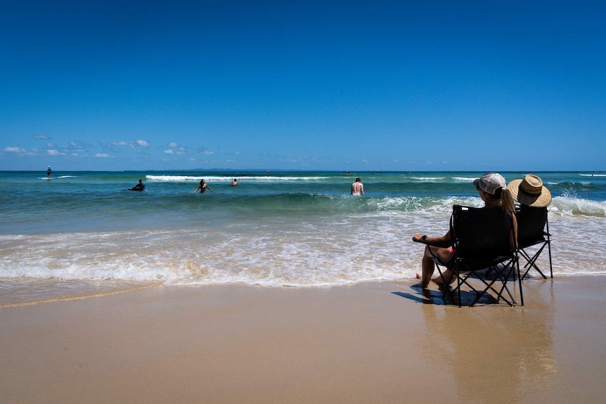 Beachgoers at Double Island point.