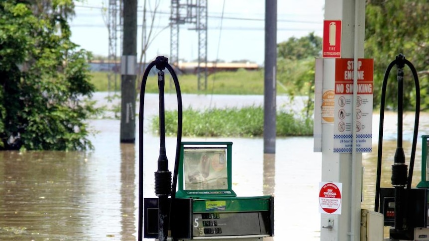 The BP service station on Gladstone Road, Rockhampton, is submerged by floodwaters