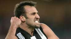 Anthony Rocca celebrating a goal for Collingwood.
