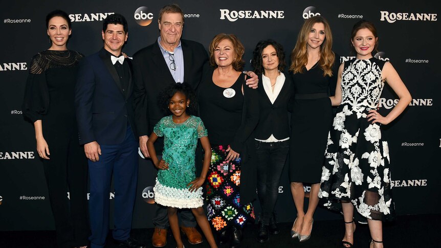 The Roseanne revival cast pose at the premiere of the series.