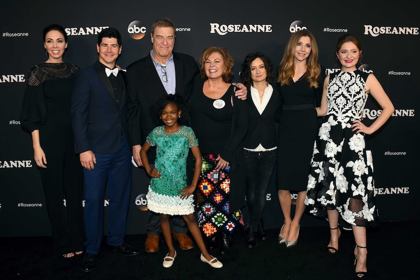 The Roseanne revival cast pose at the premiere of the series.