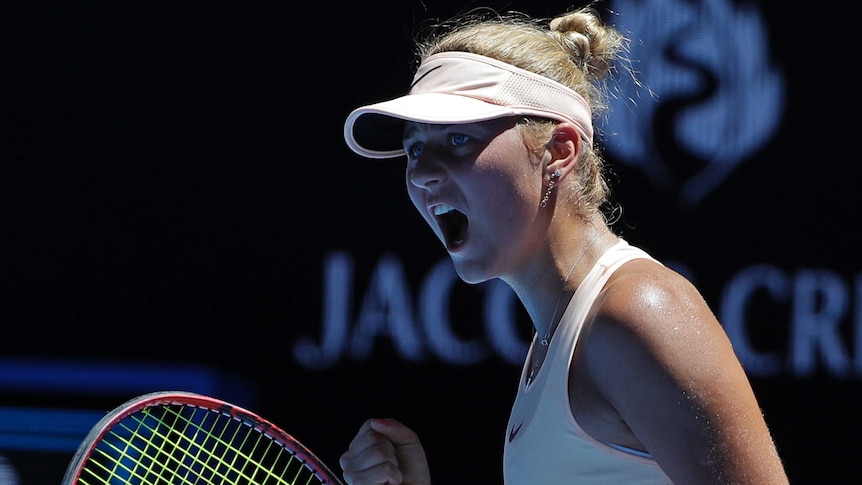 Marta Kostyuk celebrates win over Olivia Rogowska at Australian Open