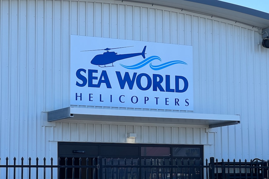 A sign saying Sea World Helicopters.