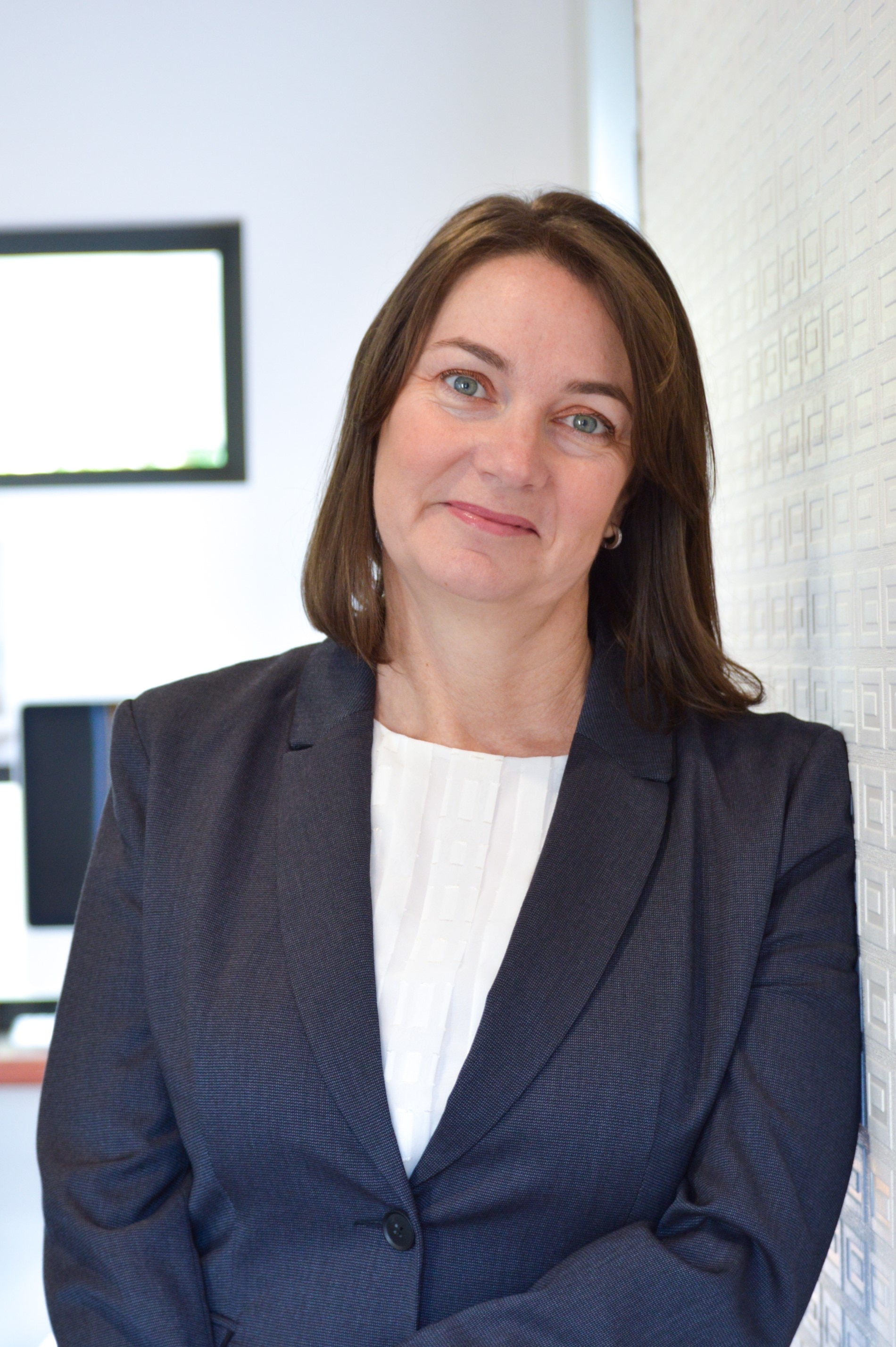 Brown haired woman smiling